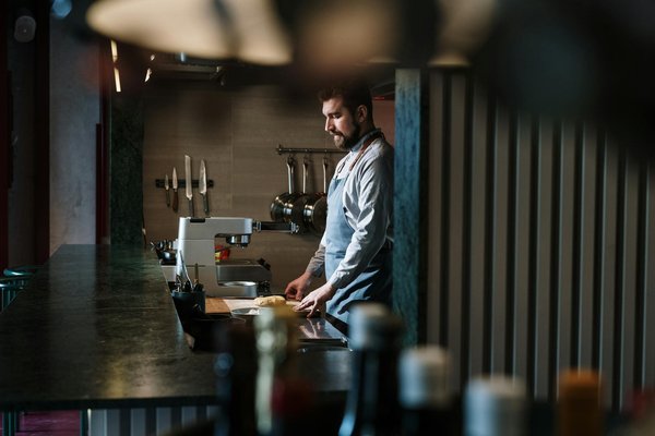 How can investing in a quality grater enhance your cooking and baking skills?